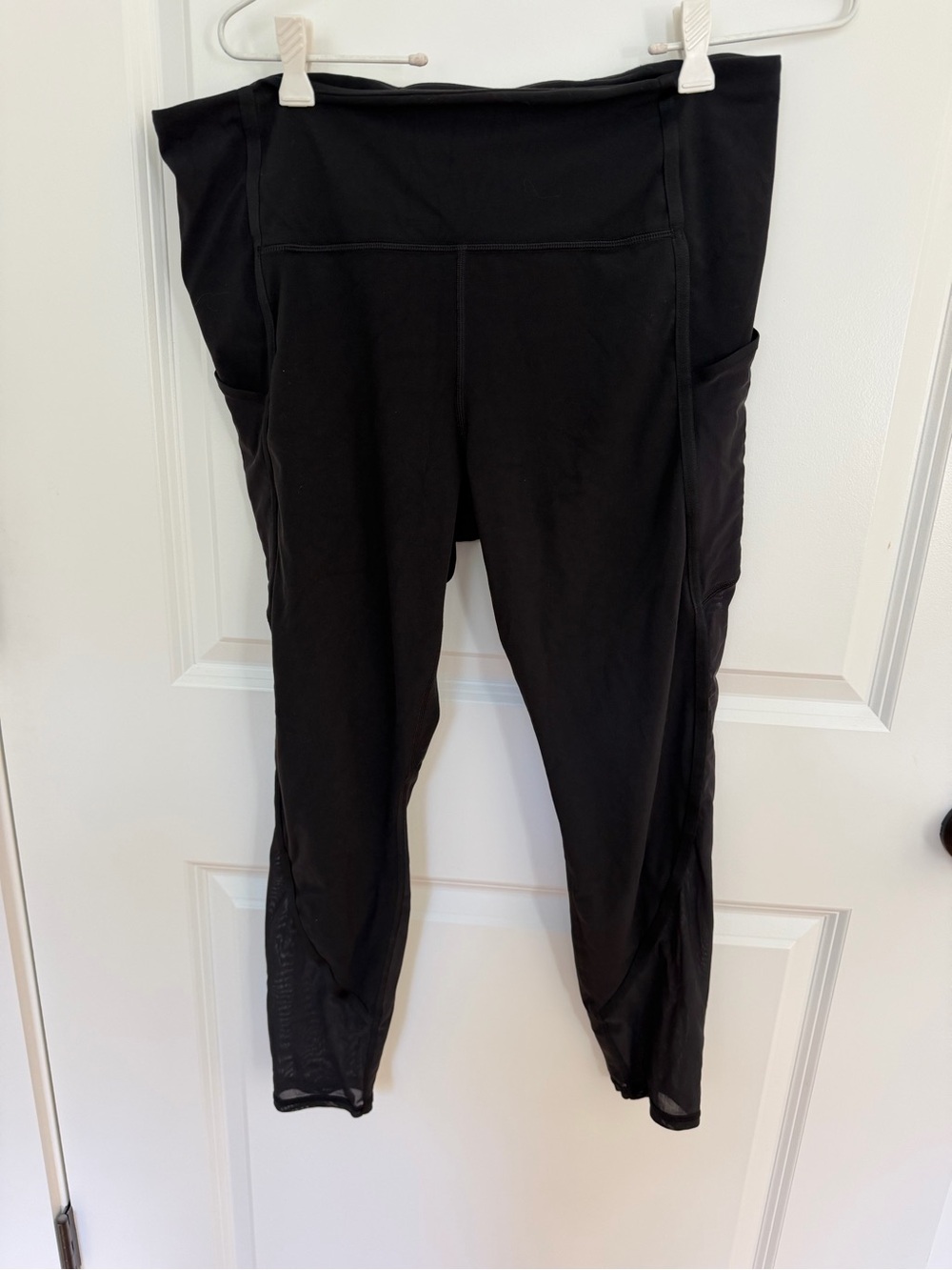 Athleta Black High-Waist Leggings with Side Phone Pockets